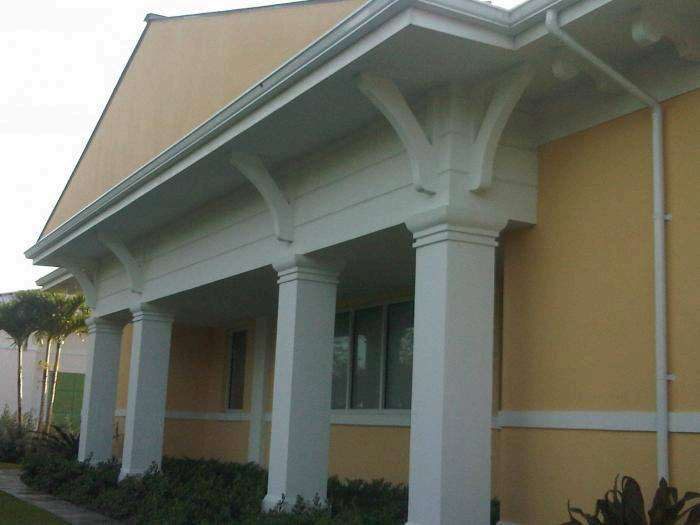 Custom foam columns and arches on a building